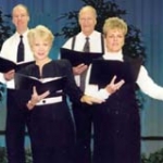 Four people read scripts in a Choral Reading.